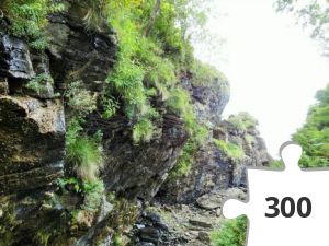 Jigsaw puzzle - Ned ad skrænten og rundt om pynten....