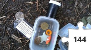 Jigsaw puzzle - A Cache with a Coin
