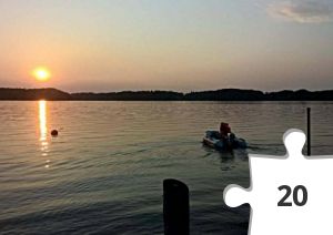 Jigsaw puzzle - GM7K sejler ud i solnedgangen