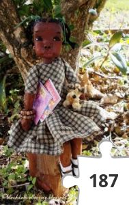 Jigsaw puzzle - Black Doll Collecting: Meet Kizzy, She is Sitting Under A Tree With Her Toys And Books,  By Kor January